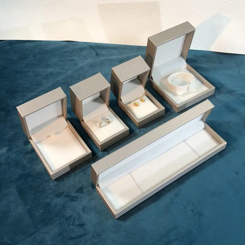 Golden PU textured leather jewelry box, fashionable accessory packaging box, ring box, pearl stud earrings box. TWINKLE QUEEN