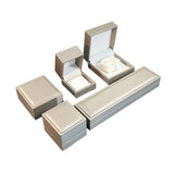 Golden PU textured leather jewelry box, fashionable accessory packaging box, ring box, pearl stud earrings box. TWINKLE QUEEN