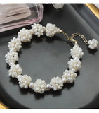 Baroque flower-shaped pearl necklace set.Bold Nature. Unapologetic Style. TWINKLE QUEEN